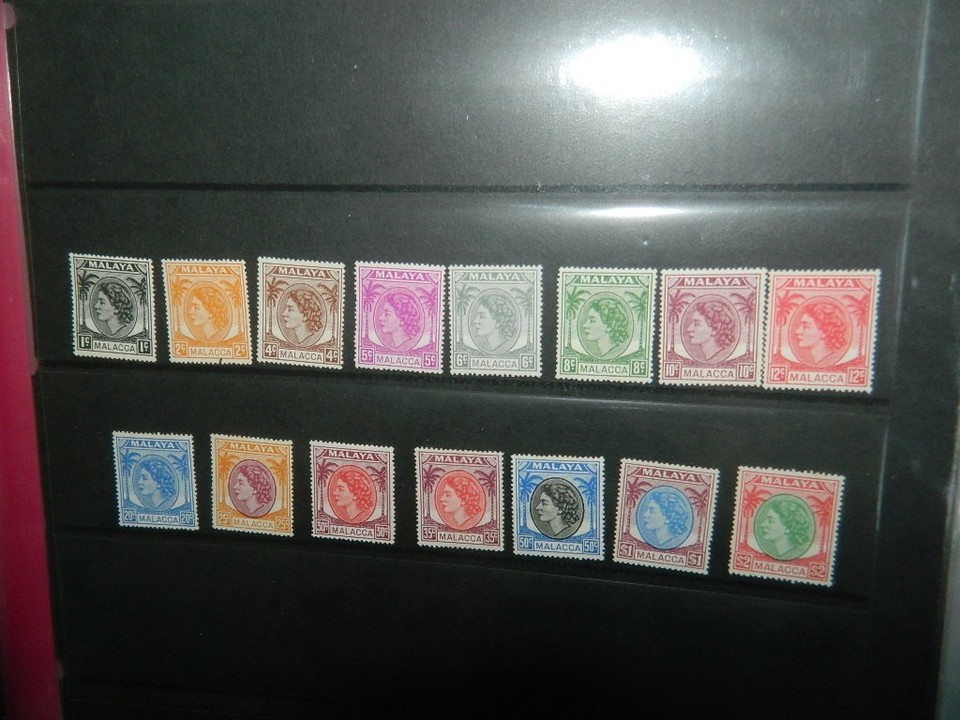 NORTH BORNEO & MALAYAN STATES STAMPS COLLECTION ON PAGES IN FOLDER ...