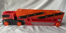 2018 Hot Wheels Mega Hauler Truck FTF68 Orange-Red Display Holds 50 Diecast Cars