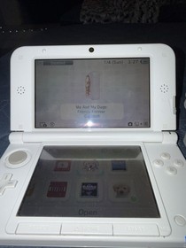 Nintendo 3DS XL Pink And White Handheld W/ Charger Pokemon Virtual Console Games