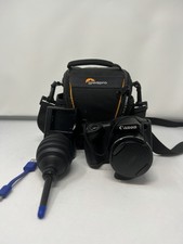 Canon PowerShot SX400 IS  Camera With Charger Bag With 16GB SD Card Included