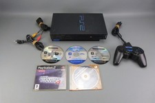 Console SONY Playstation 2, 1 mannette + 5 jeux, fonctionne bien.