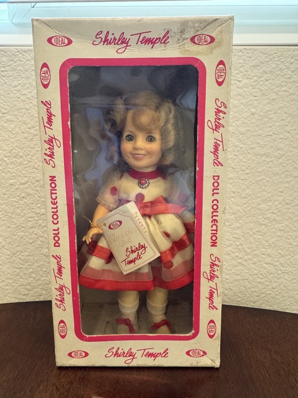 Vintage Shirley Temple Doll, 1982, Clothing a bit dusty. Otherwise new condition