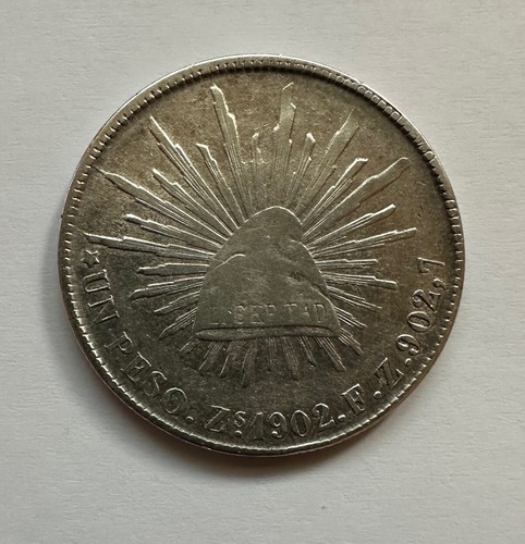 1902 Mexico Un Peso Zs FZ Silver Cap and Rays Coin
