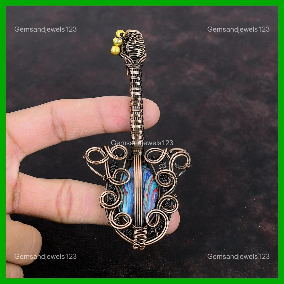 Colgante de guitarra envuelto en alambre de calsílice arco iris natural cobre oferta del día de las hermanas Foto 4 de 4
