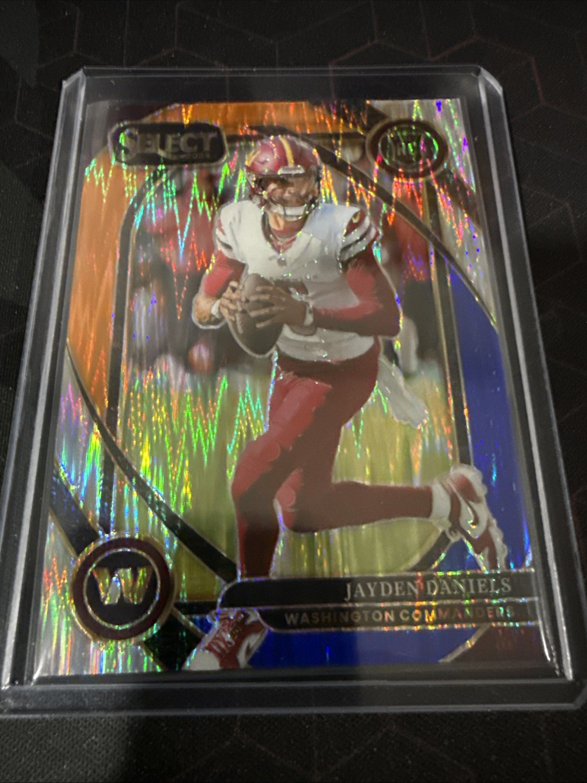 2024 Select Jayden Daniels Club RC Blue and Orange Prizm Shock #29/35 Commanders