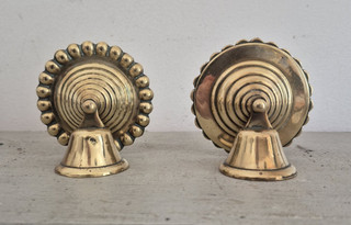 Two similar antique bell form brass horse bridle rosettes in excellent condition
