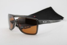 OAKLEY OO9147-0563 CASTEL GREY BROWN PRIZM POLARIZED AUTHENTIC SUNGLASSES 63-12