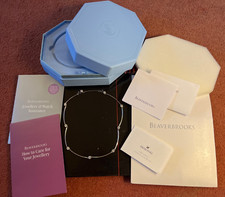 Swarovski crystal silver necklace with extension. In Beaverbrooks packaging 