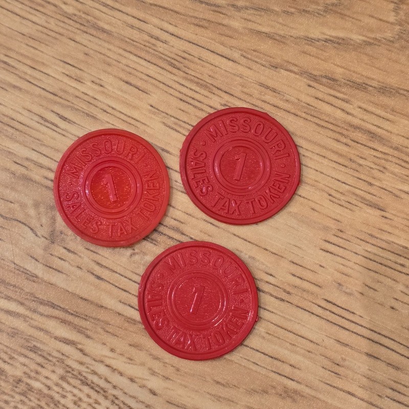 Three (3) Missouri Sales Tax Tokens-1 Mill (1/10¢) - Red Plastic