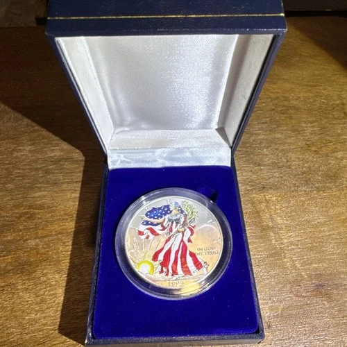 1999 1 oz Silver American Eagle (Brilliant Uncirculated) COA. Painted/Colorized