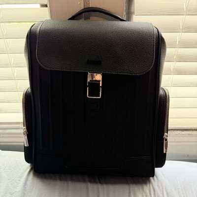 RIMOWA Black Backpack Drawstring Top Buckle Flap Zip Pockets Adjustable Straps
