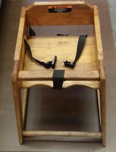 Restaurant booster seat. The Marston by Tomlinson.  Solid oak, 27" w/ restraint