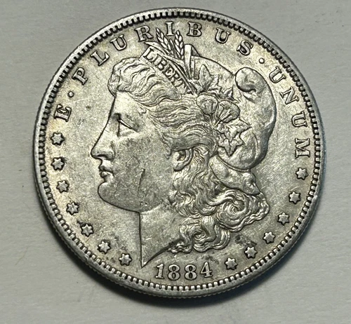 1884 S  MORGAN DOLLAR AU