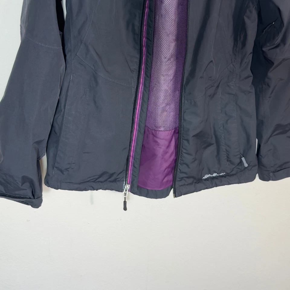 Chaqueta de lluvia Eddie Bauer Weatheredge pequeña negra púrpura con capucha para mujer Foto 3 de 4