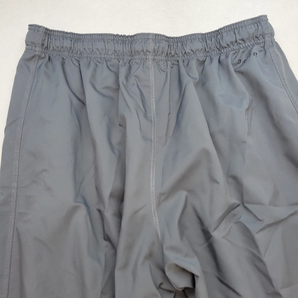 Pantalones deportivos Nike para hombre XL grises relajados rectos Dri Fit ropa deportiva atlética Foto 4 de 4