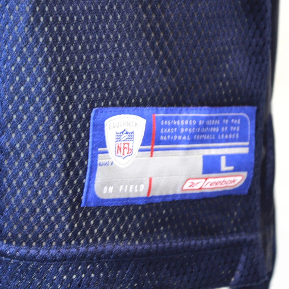 Camiseta deportiva grande Reebok de la Liga Nacional de Fútbol Americano Steve McNair Tennessee Titans Foto 3 de 4