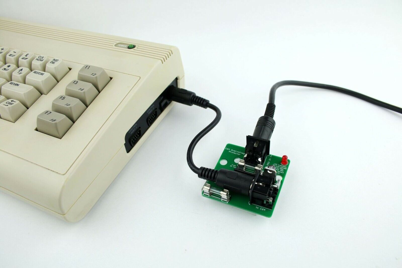 Faszination C64 Überspannungsschutz für Commodore 64, Neuware 2160