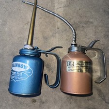 2 Vintage pump oiler