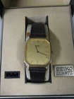 Vintage Seiko Men's Quartz Watch 6430-5079 - Gold Tone Dial and Case, Black Band