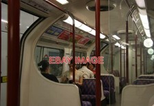 PHOTO  BAKERLOO LINE TRAIN AT EMBANKMENT INSIDE A BAKERLOO LINE TRAIN. BROWN HAN