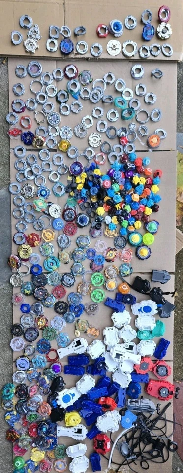 RETRO Enorme Lote Super Raro De Colección Metal Plástico Beyblade Tomy Hasbro Lote Masivo Foto 2 de 4