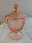 Vintage pink depression glass candy dish with a lid by Jeanette Glass Co.