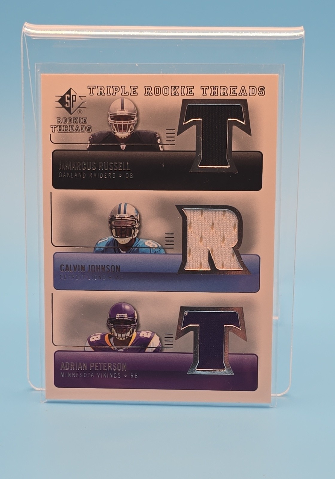 2007 SP Rookie Threads Triple Rookie Threads Peterson, Johnson, Russell #TRT-JRP