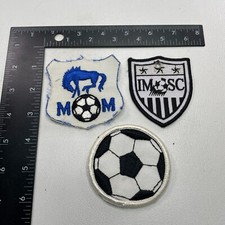 LOT OF 3 MIXED SOCCER PATCHES THE 2 OTHER THAN THE BALL ARE IN BAD SHAPE 261F