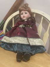 Porcelain Doll With Present Brown Hair