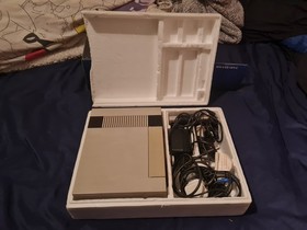 Boxed Nintendo NES console and Mario/Duck Hunt Game