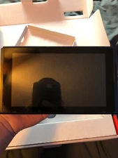 Nintendo switch, with pro controller, and 4 games, comes in original package