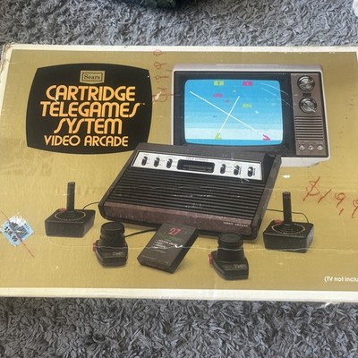 Atari 2600 Sears heavy sixer console IN ORIGINAL BOX. Extra controllers included