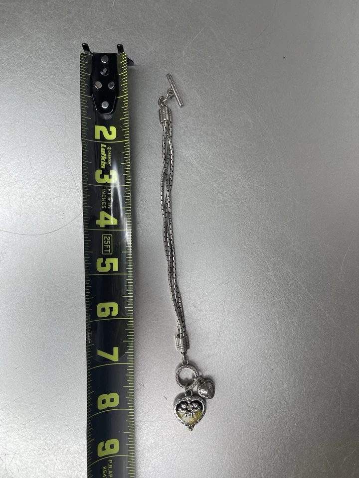 Brazalete Brighton Dos Corazones Amarillo Negro Flor Palanca Plateado Plato Dije Foto 3 de 3