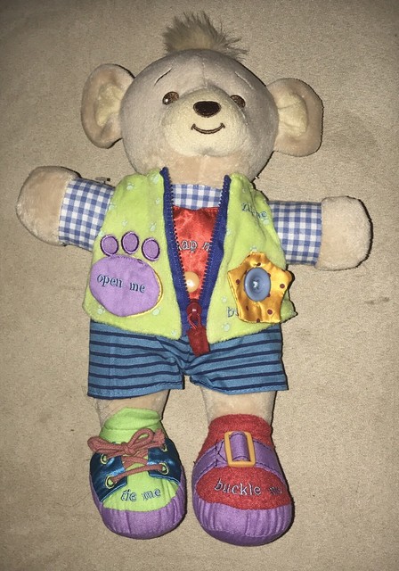 learning doll with zippers and buttons