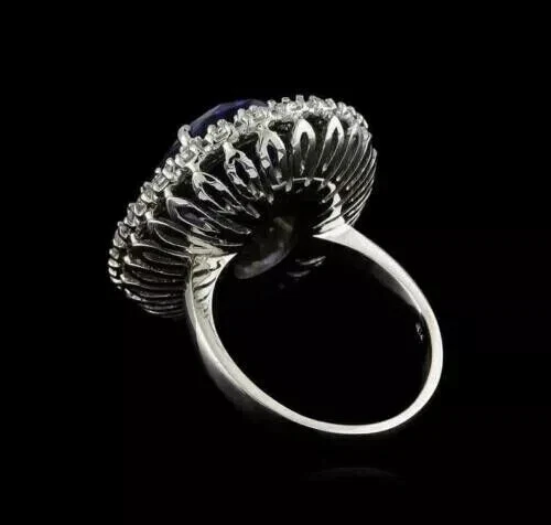 Anillo ovalado de 2,50 quilates con halo de tanzanita azul natural y moissanita de oro blanco sólido de 14 quilates Foto 4 de 4