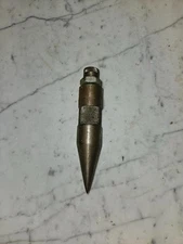 vintage brass plumb bob ready for either work or diplay