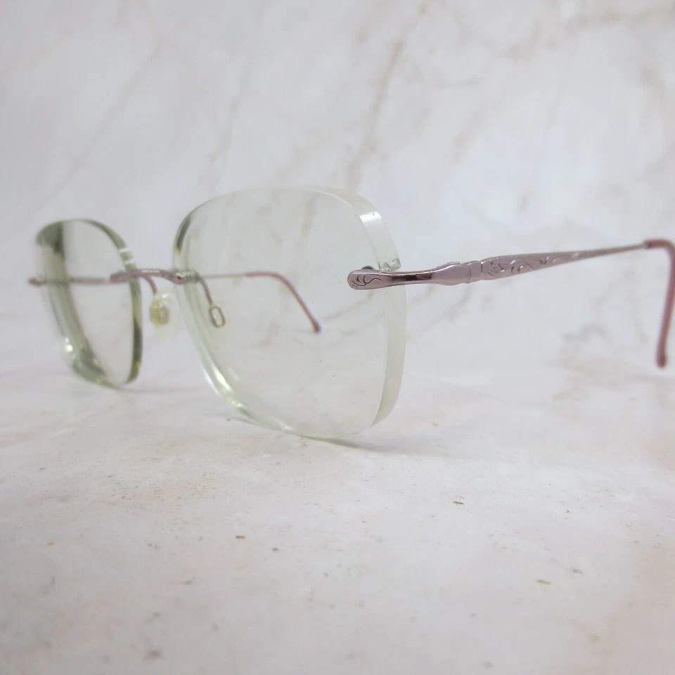 Marco de gafas Marchon Tres Jolie brillante Lovander para mujer oro rosa sin montura 135 Foto 2 de 4