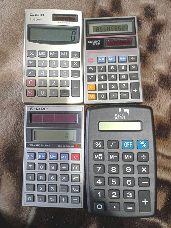 4 Vintage Calculators 2 Sharp 1  Casio  1 Federal  Working 1980s