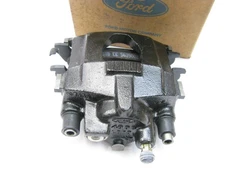NEW - OEM Ford F5AZ-2552-A Loaded Disc Brake Caliper - Rear Left / Right