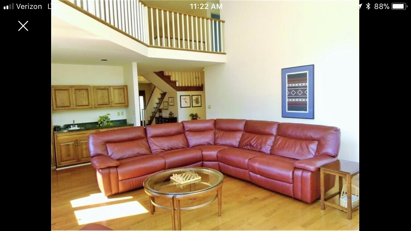 used leather sectional sofa w/two electric powered recliners on each