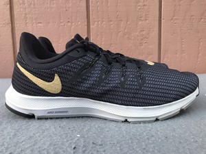 nike quest black gold