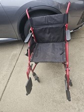 Foldable Lightweight Transport Wheelchair, In Red  Black. Easy To Manuver .