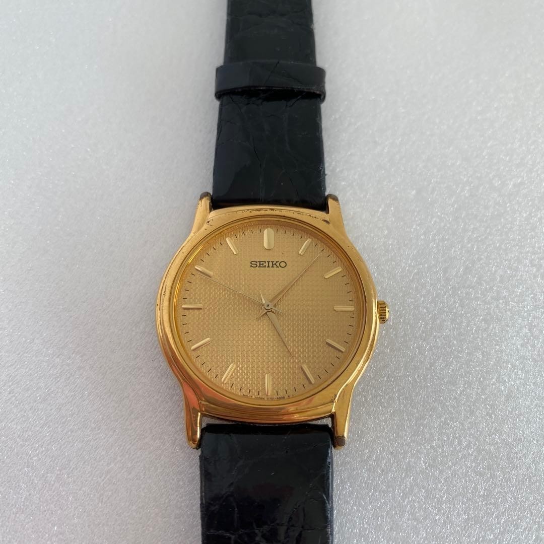 Seiko V701-A100 Quartz Men's Watch Gold Dial Analog Leather Band