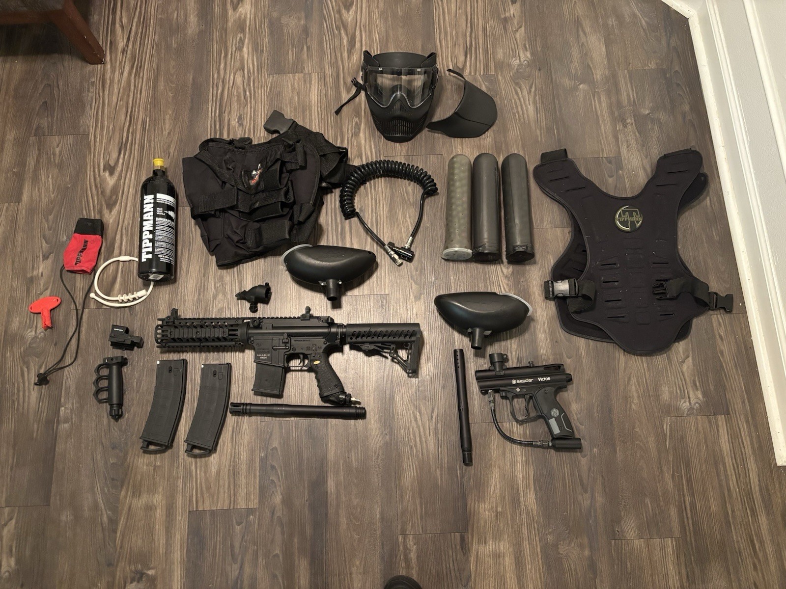 Paintball Markers and Equipment With Air Tanks And Protectiv