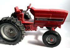 Ertl International Red Farm Tractor Grey Rims 1/16