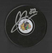 Caleb Jones Signed Chicago Blackhawks Puck