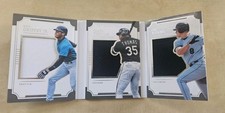 2017 National Treasures Griffey, Thomas, Ripken Jr Triple Player Materials /99