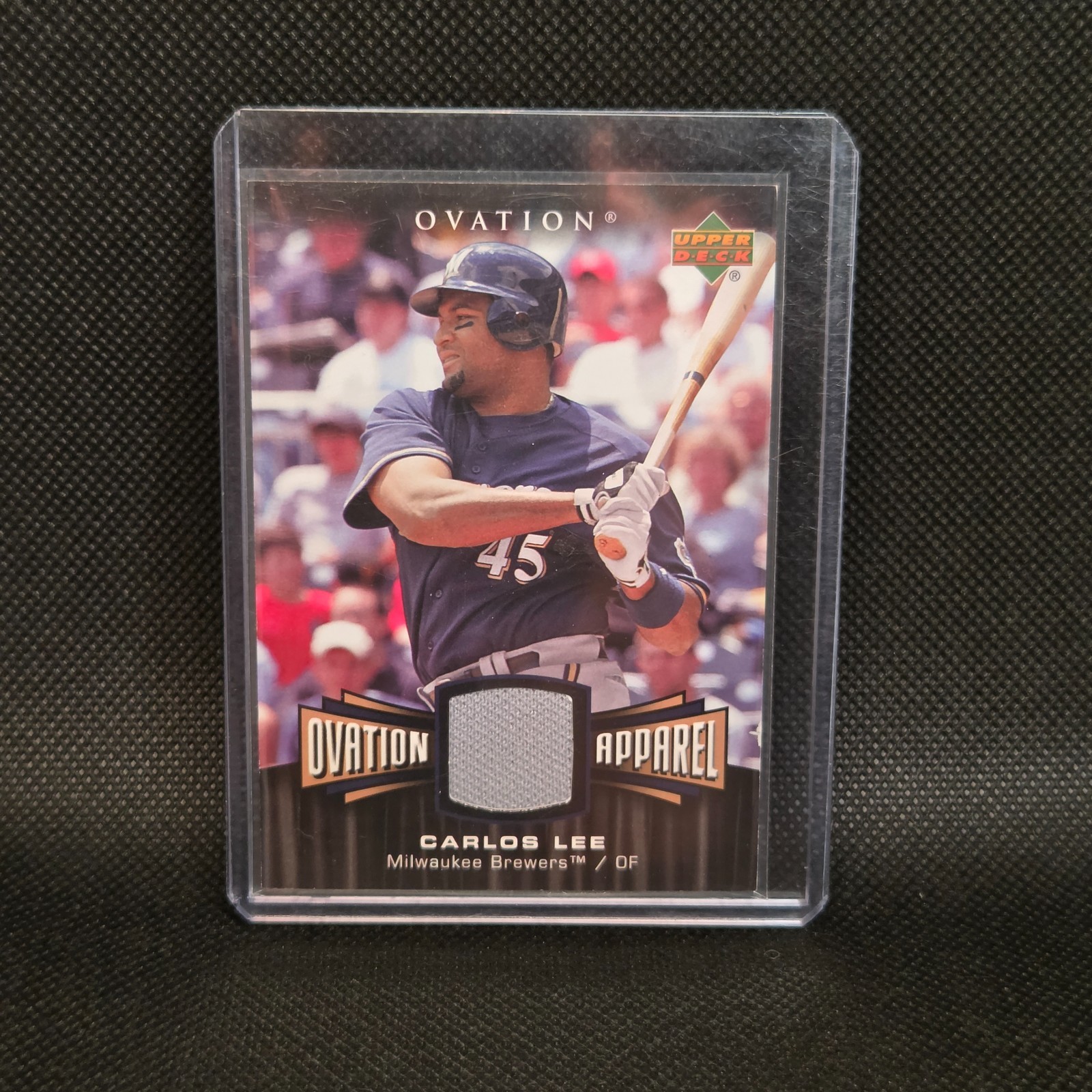 2006 Upper Deck Ovation - Ovation Apparel Carlos Lee #OA-CL (MEM)