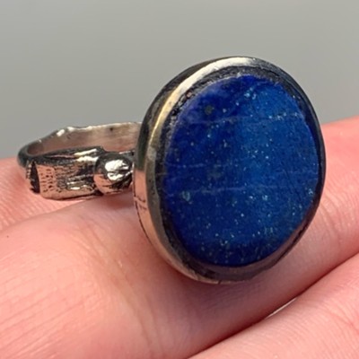 Stunning vintage ring featuring natural lapis lazuli, silver coated