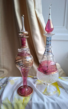 Two Tall Egyptian Pink Glass Perfume Bottles with Droppers
